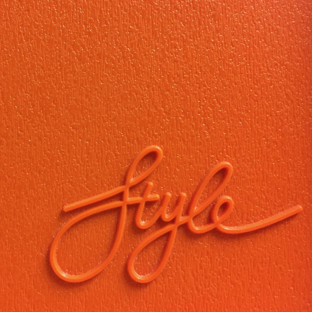 word on wall in orange